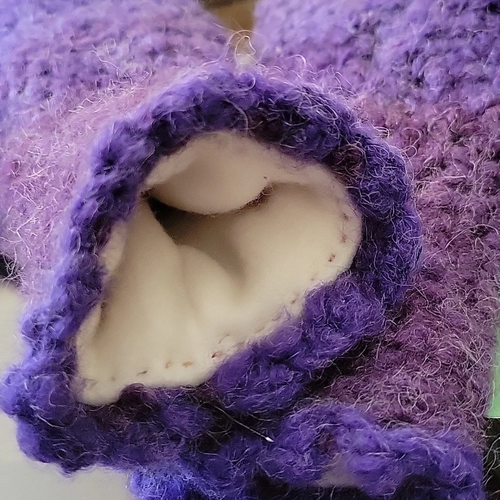 Ladies fuzzy Acrylic crocheted varigated purple mittens with cream fleece lining